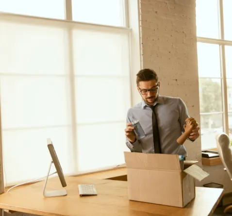 men packing his stuff